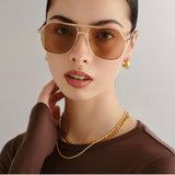 Cosmos Sunglasses in Bright Gold Tan Tint