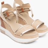 NeroGiardini Bungee Platform Wedge Sandals in Gold