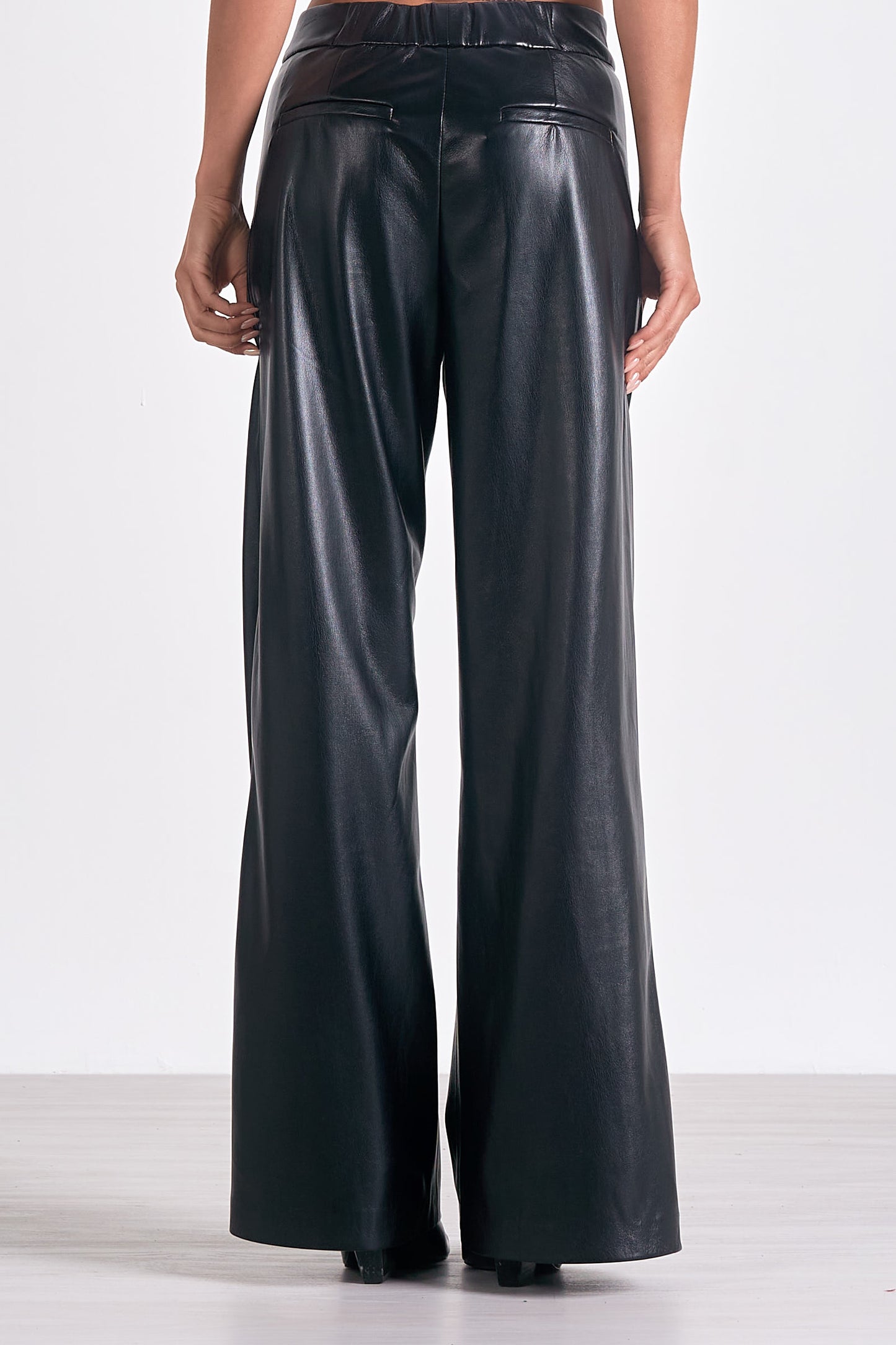 Faux Leather Trousers in Black