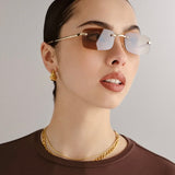 Ursa Sunglasses in Bright Gold Tan Tint